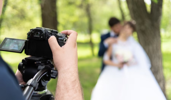 A photographer capturing a wedding